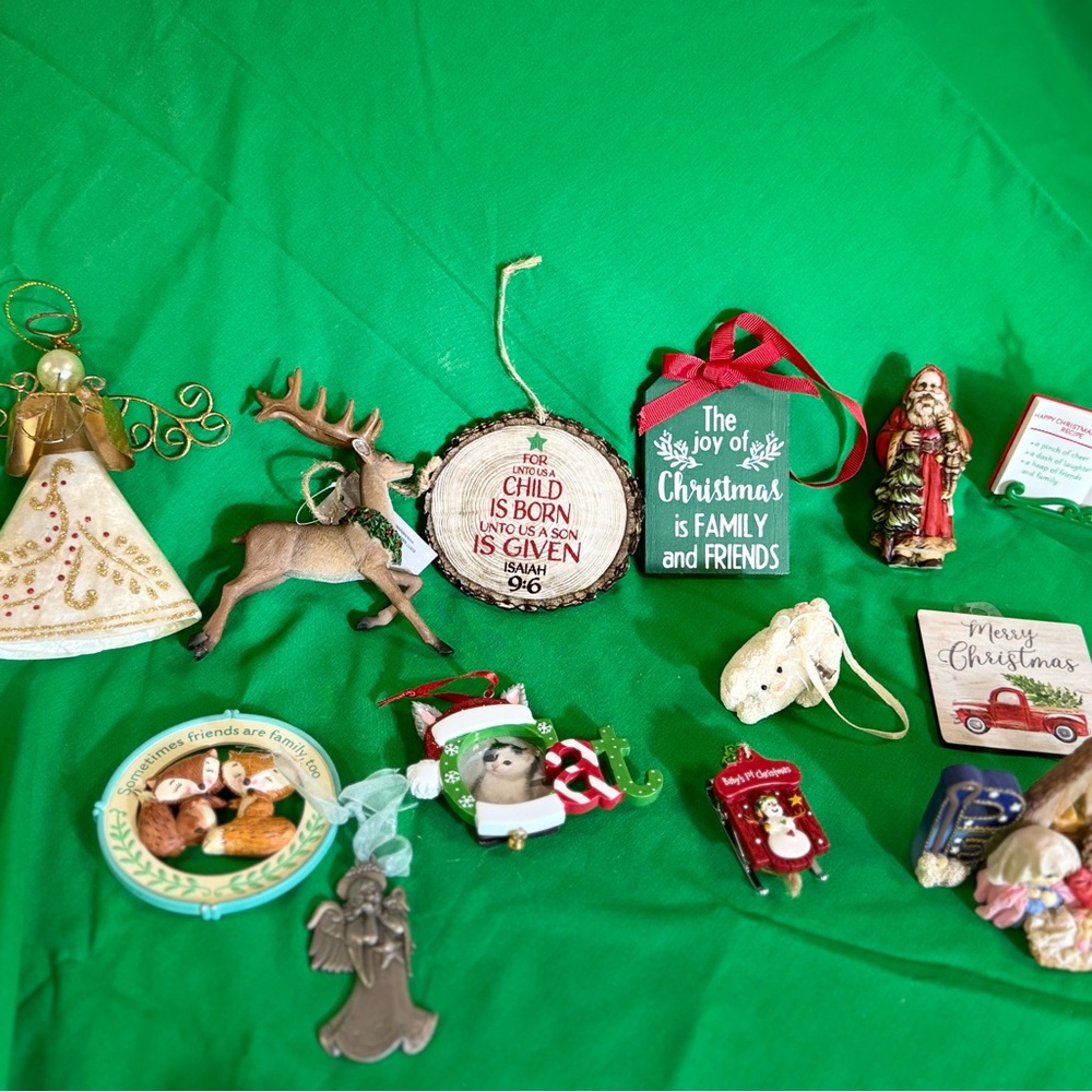 Lot of one dozen Christmas ornaments including two Hallmark. Some with tags.